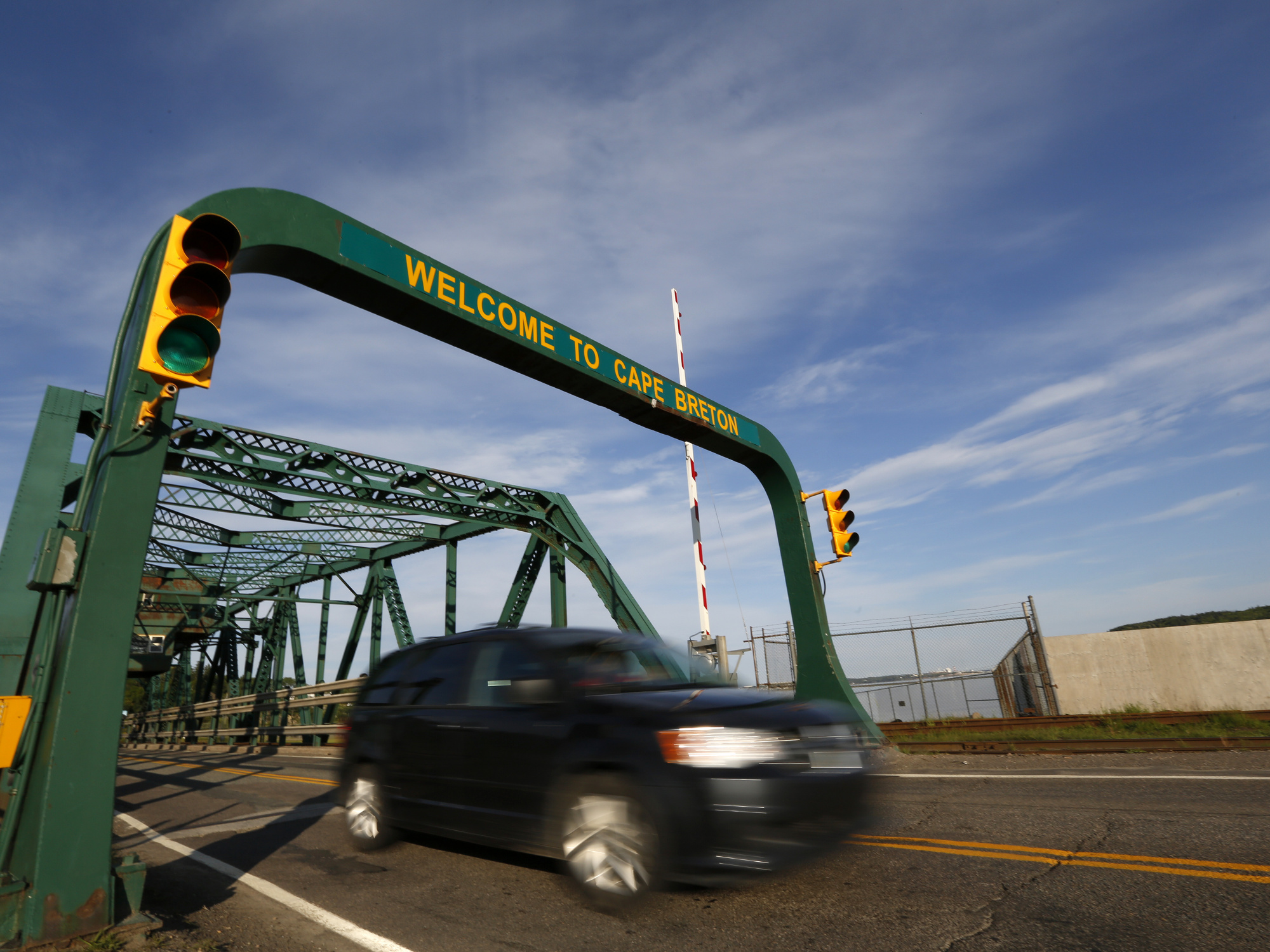 Photo showing a car crossing the Canso Causeway