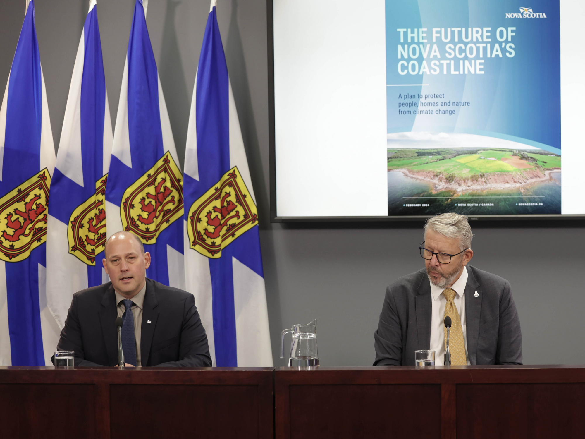 (L-R) Environment and Climate Change Minister Timothy Halman and Municipal Affairs and Housing Minister John Lohr release the coastal protection action plan. 
