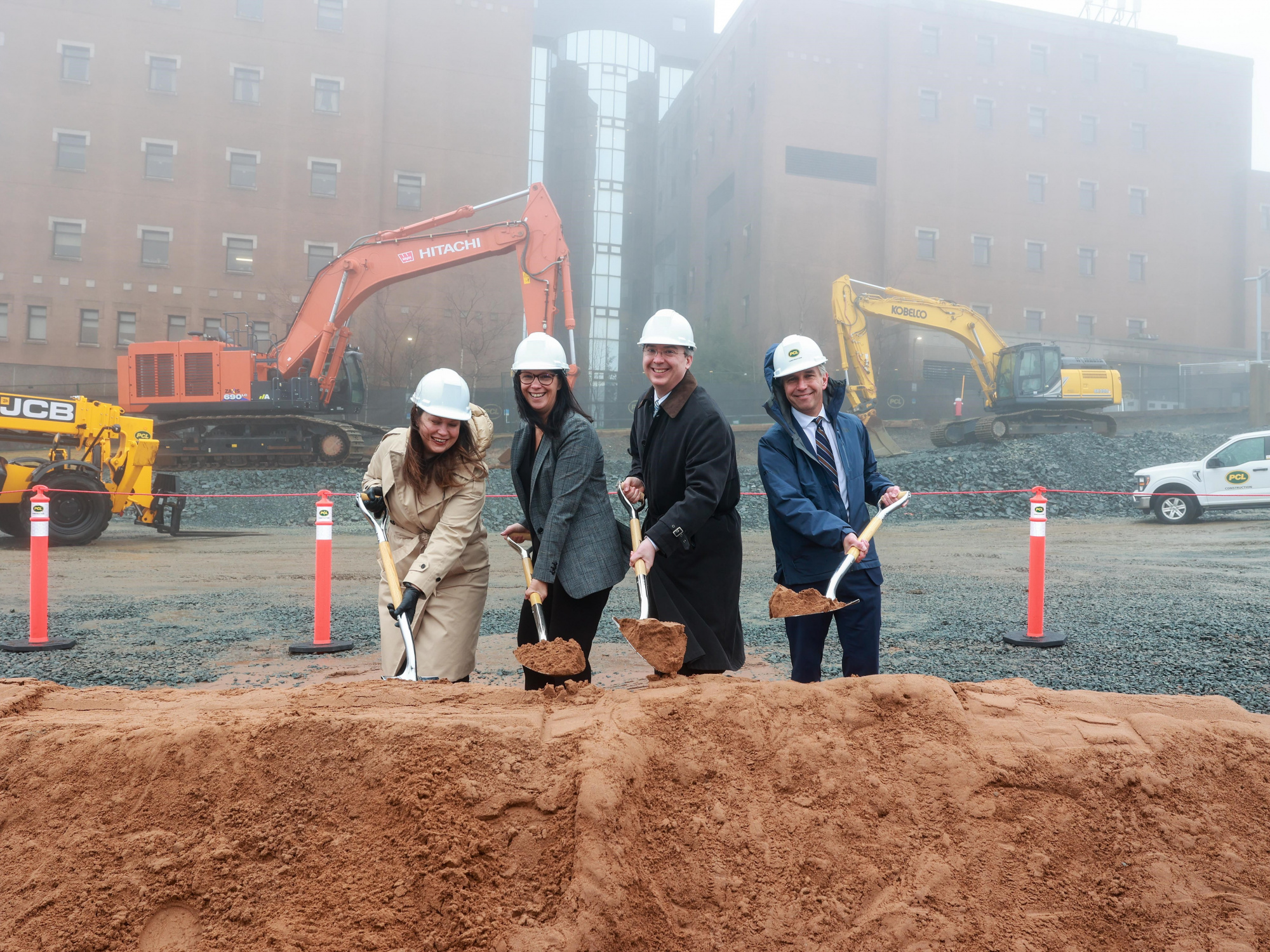 Photo of Health and Wellness Minister Michelle Thompson and others with shovels at a sod-turning