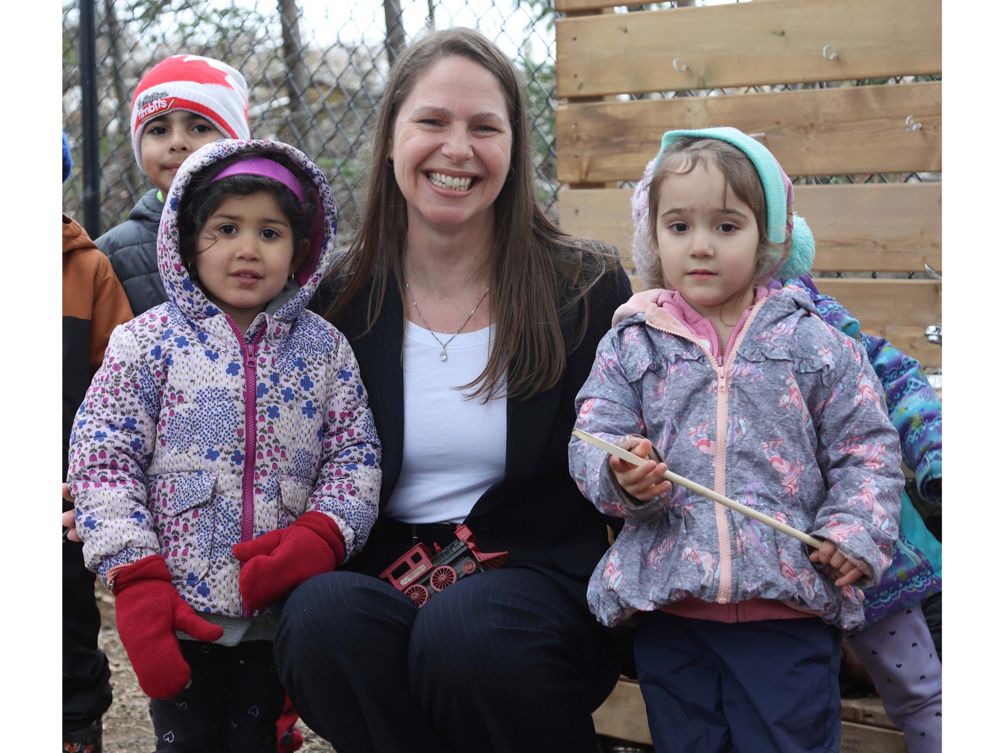 Photo of Education and Early Childhood Development Minister Becky Druhan with children