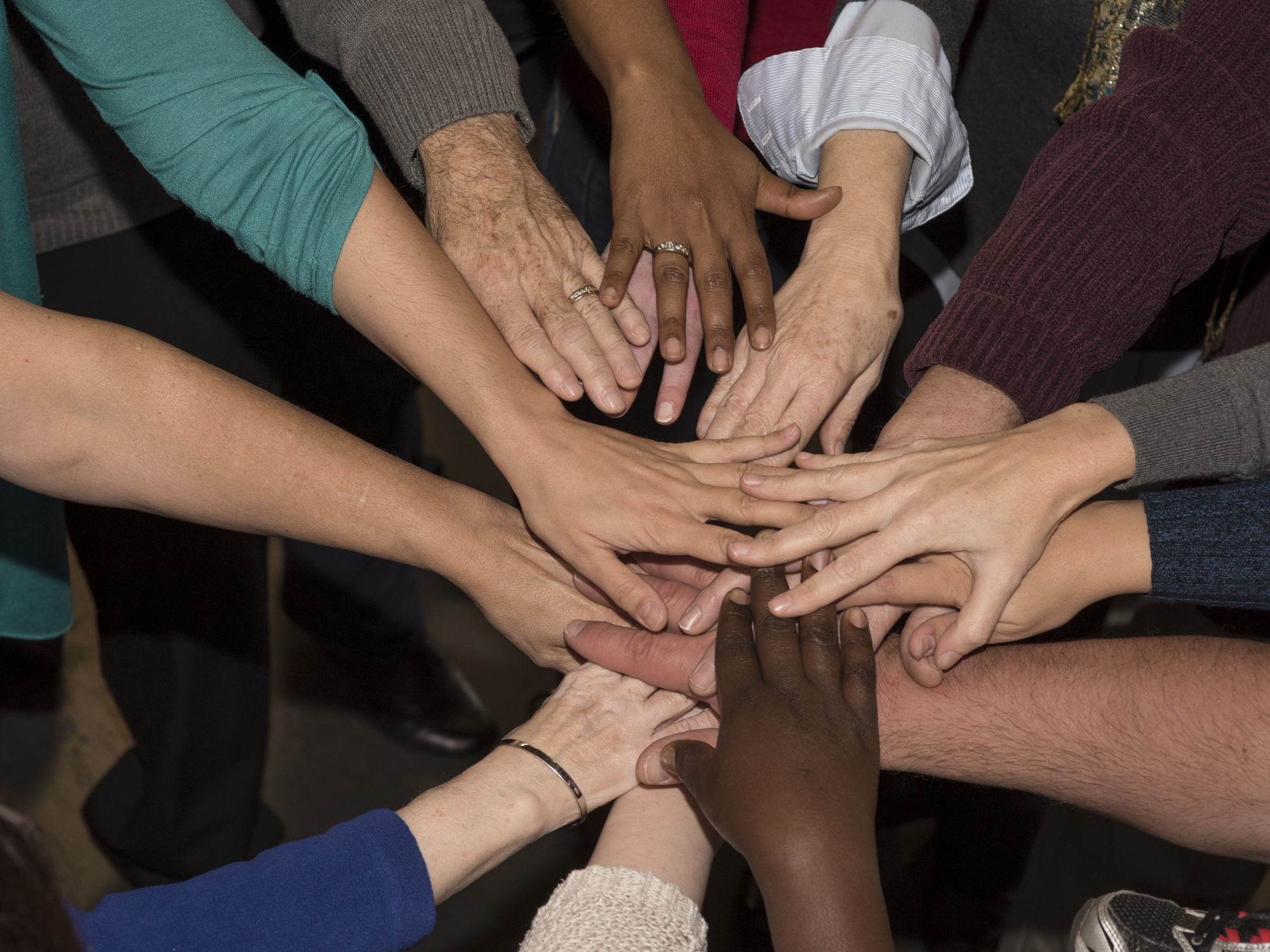 Photo of hands in a circle