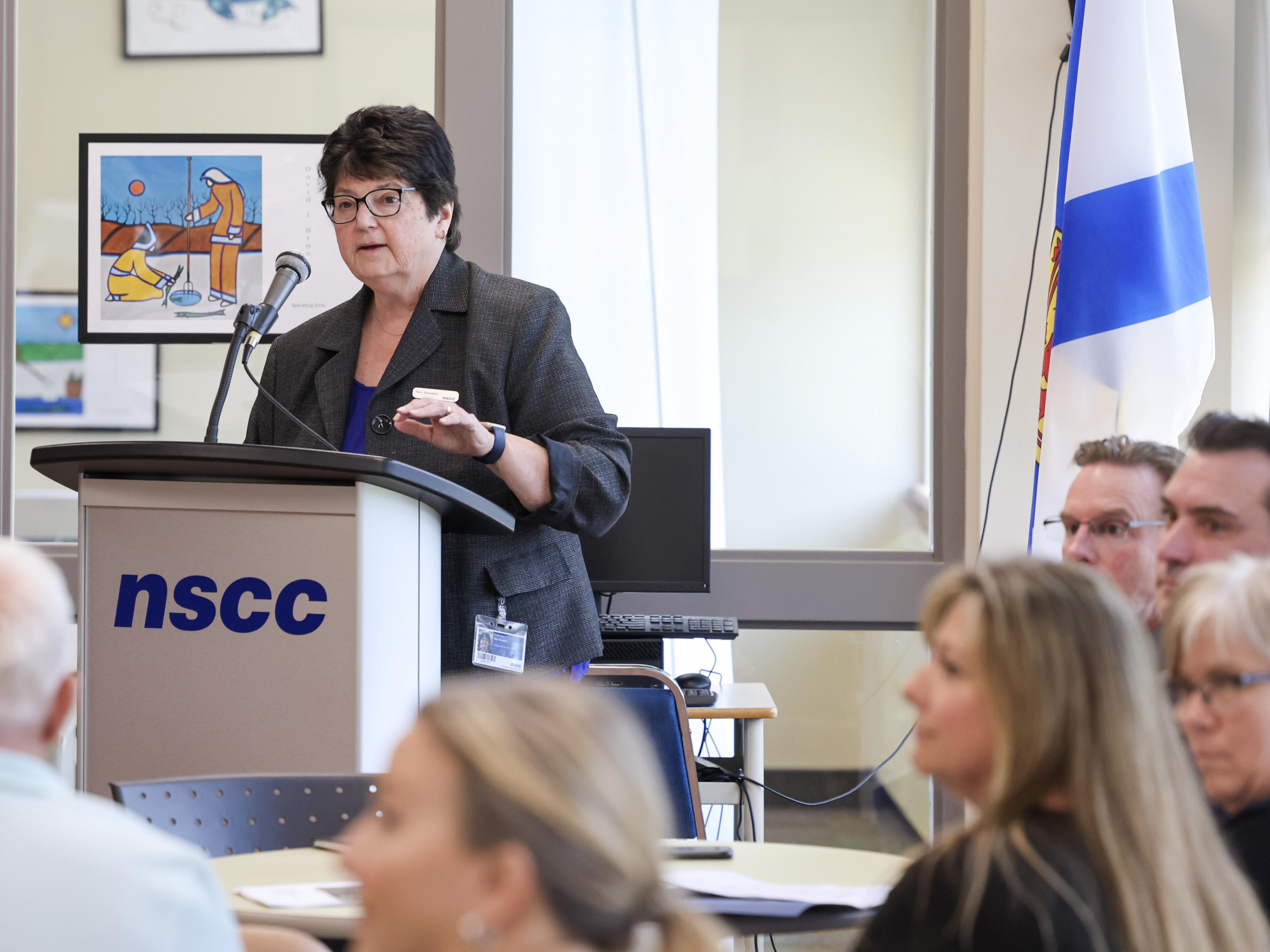 Photo of Mary Thompson, Principal of NSCC's Shelburne campus, at a podium