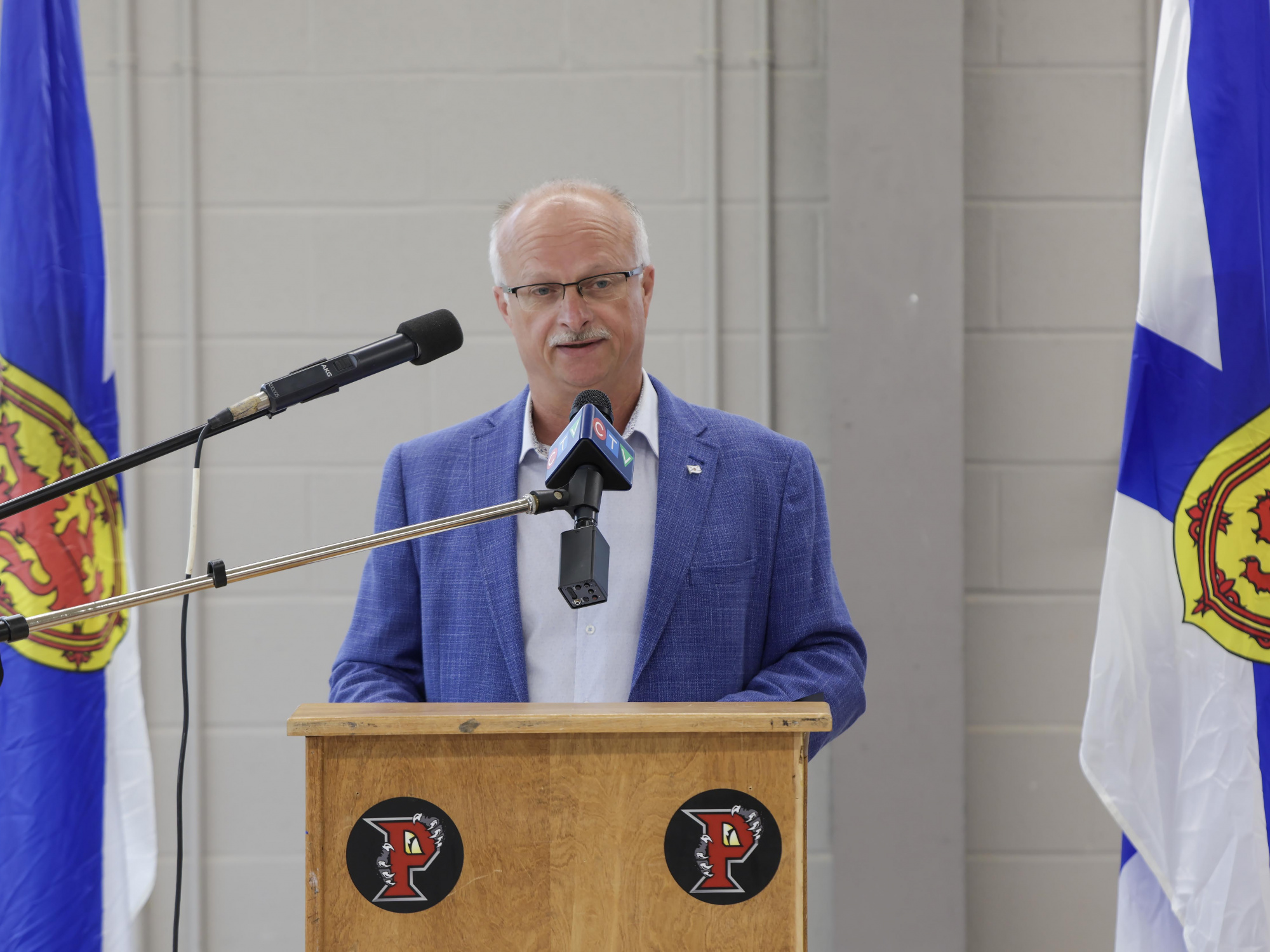 Glace Bay-Dominion MLA John White introduces the speakers at a skilled trades pathway pilot event at Glace Bay High School. (Communications Nova Scotia)