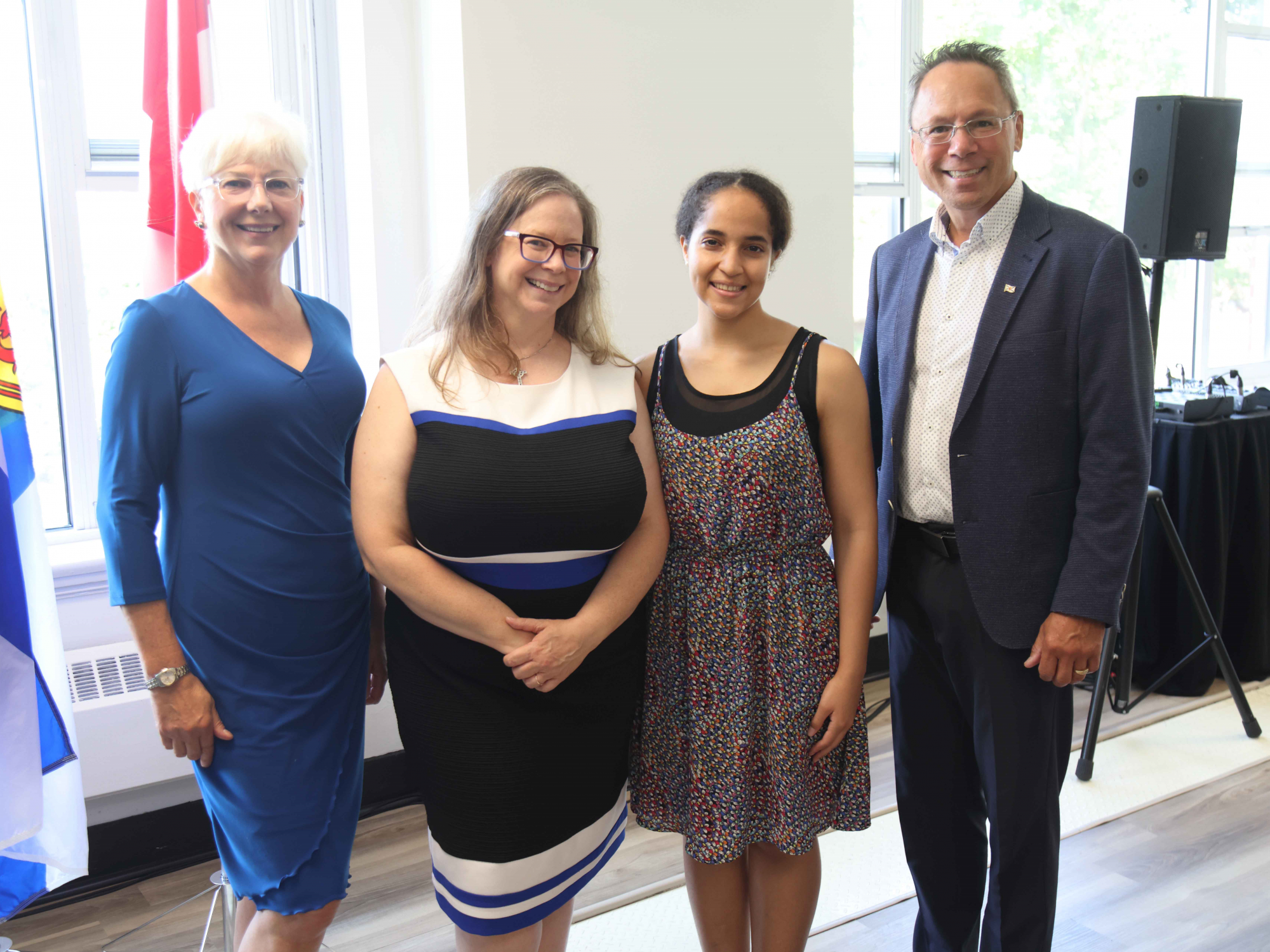 L-R: Linda Yates, Atlantic School of Theology board Chair; Heather McCance, President, Atlantic School of Theology; Francesca Southwell, Saint Mary's University student living on the campus; and Advanced Education Minister Brian Wong during the event. (Communications Nova Scotia) 