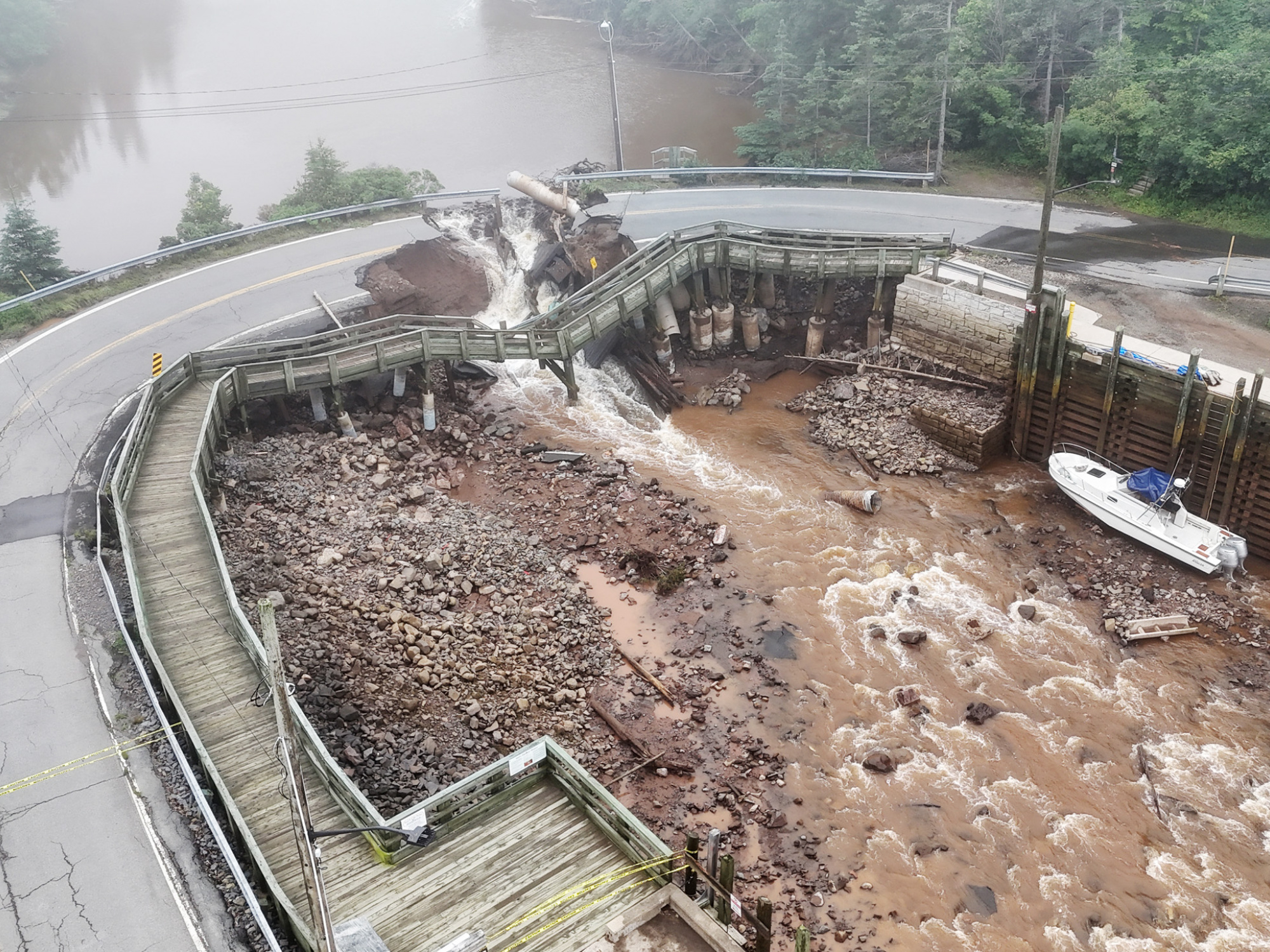 Photo of water breaking through a road in Halls Harbour