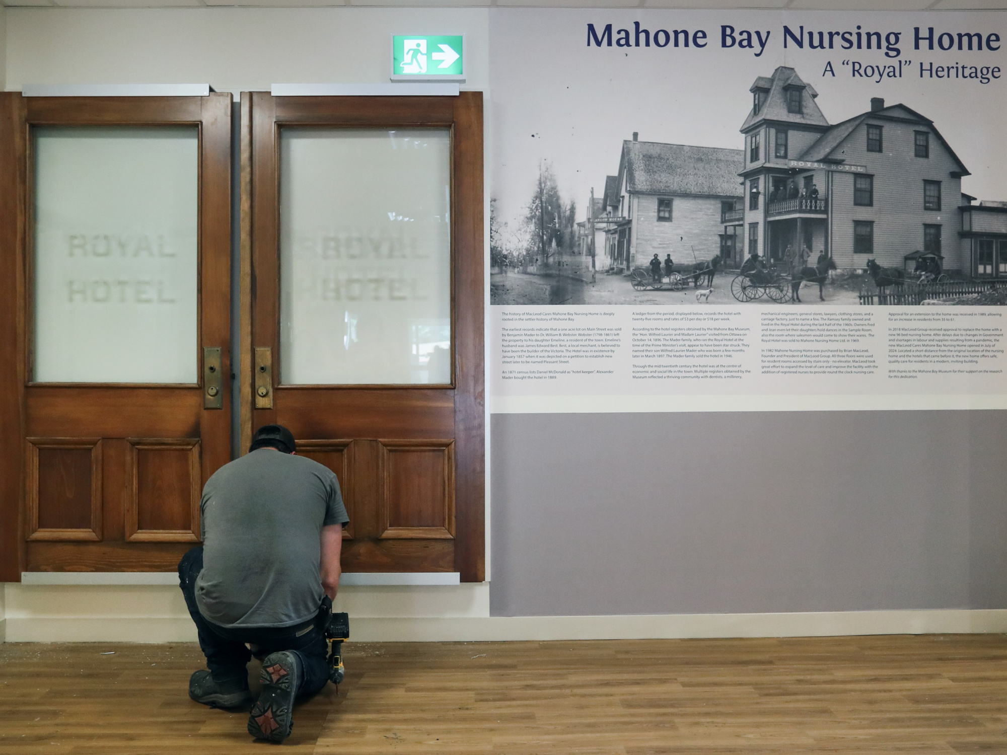 Photo of worker at the Royal Hotel display in the Mahone Bay Nursing Home