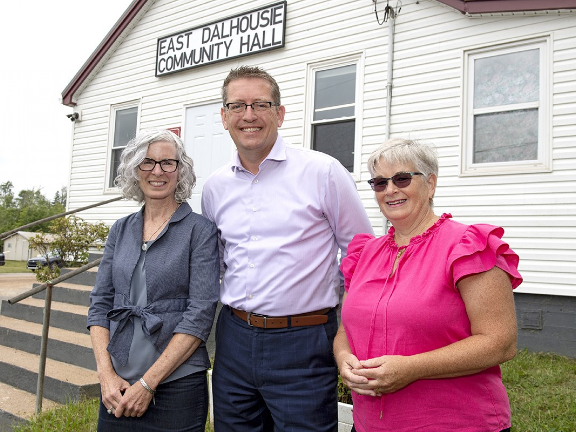 Photo of Debbie Nielsen from the Nova Scotia Federation of Municipalities, MLA of Kings West, Chris Palmer, and Susan MacDonald from the Lake Torment Stewardship Association 