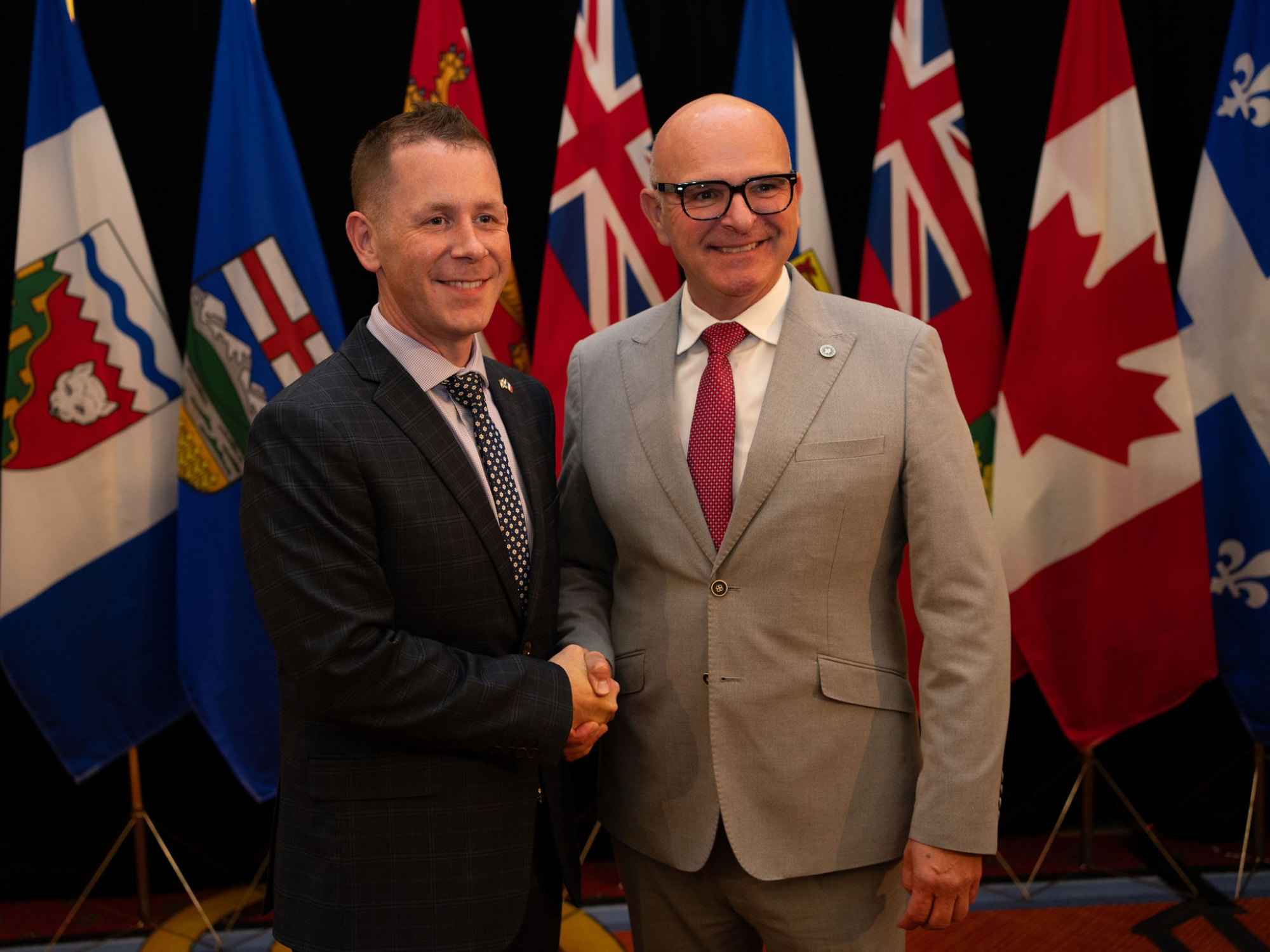 Colton LeBlanc, Minister of Acadian Affairs and Francophonie, left, and Randy Boissonnault, federal Minister of Employment, Workforce Development and Official Languages