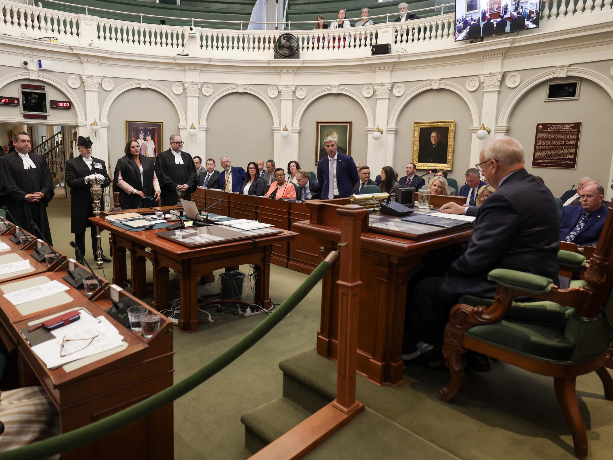 Photo of Lt.-Gov. Arthur LeBlanc in the Speaker's chair across from new Speaker Danielle Barkhouse