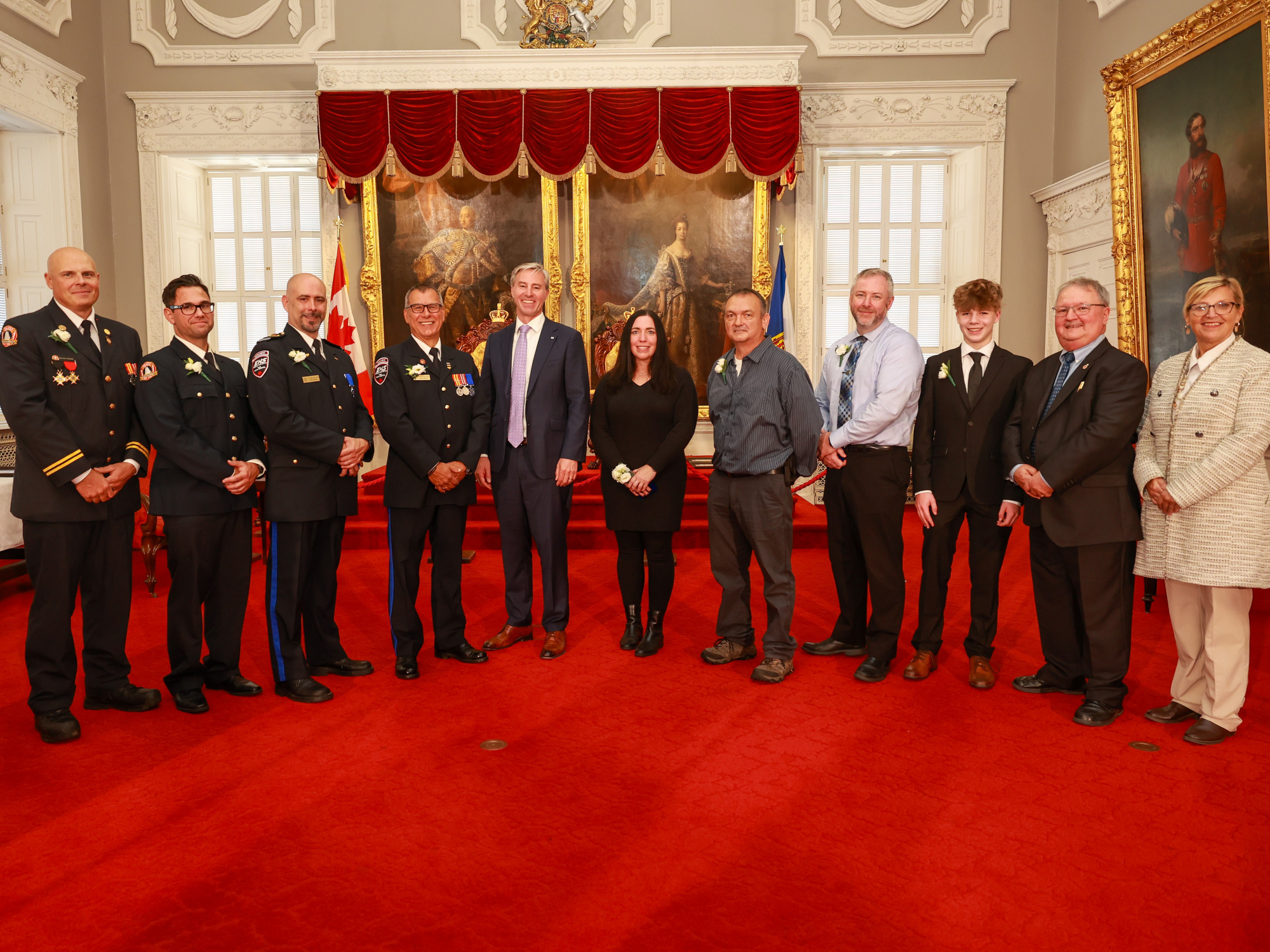 Photo of 2024 Medal of Bravery award recipients with Premier Tim Houston and Justice Minister Barbara Adams.