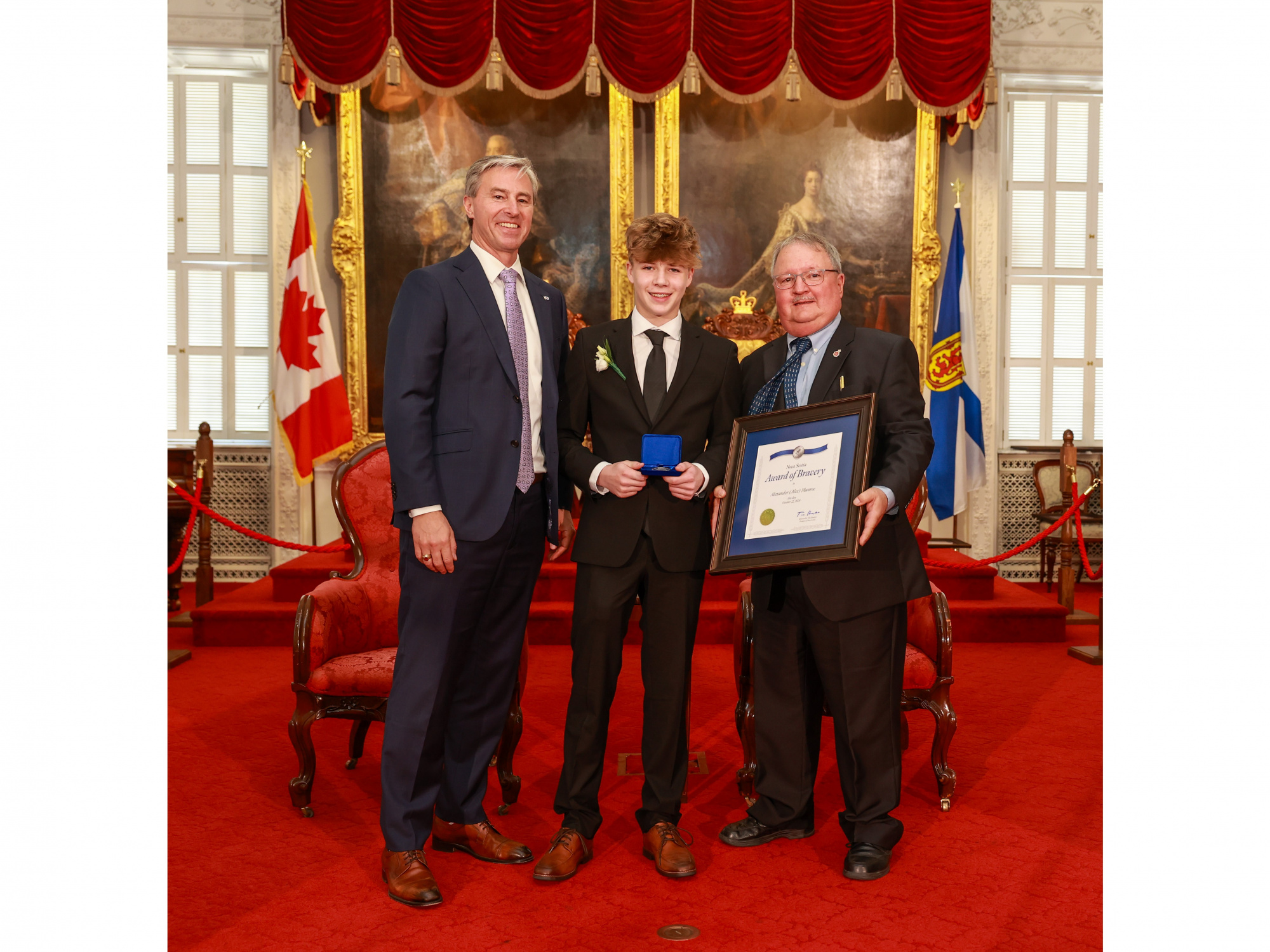 Photo of 2024 Medal of Bravery award recipient Alex Munroe with Premier Tim Houston and Medal of Bravery Advisory Committee Chair Tom Steele