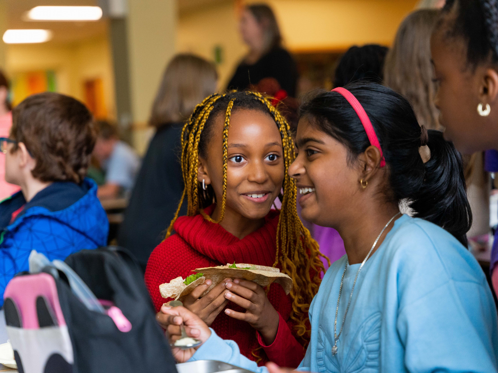 Photo of two students at lunch