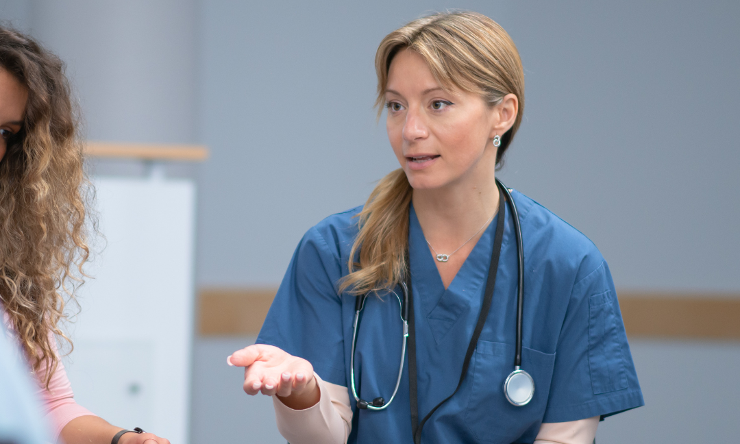 A nurse takes part in a group counselling session