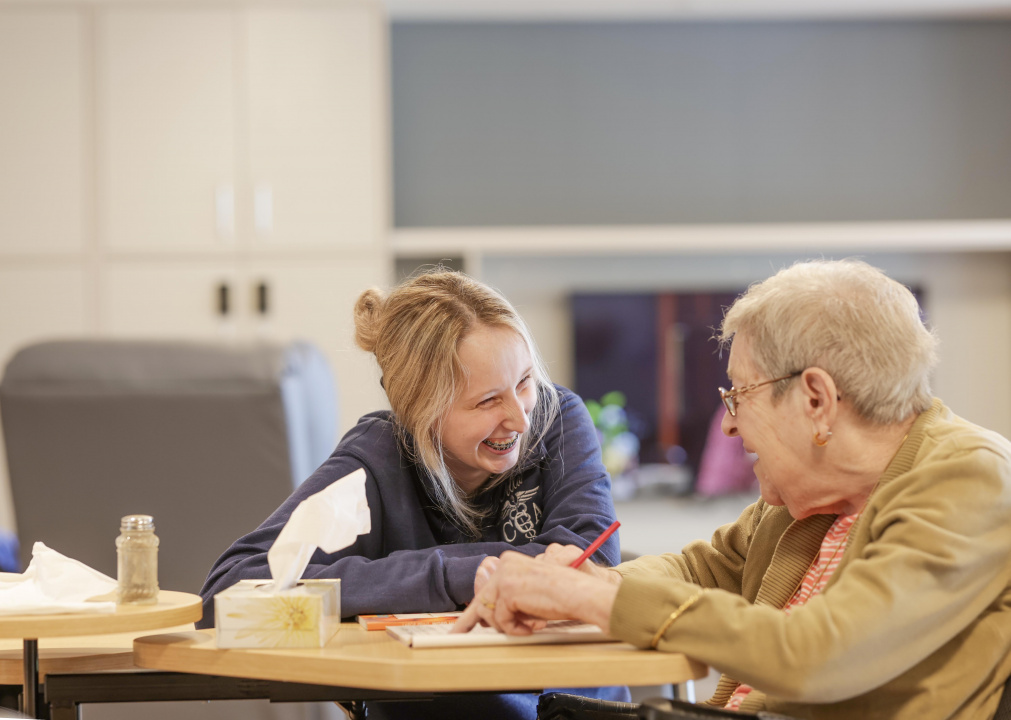 A CCA shares a laugh with a client