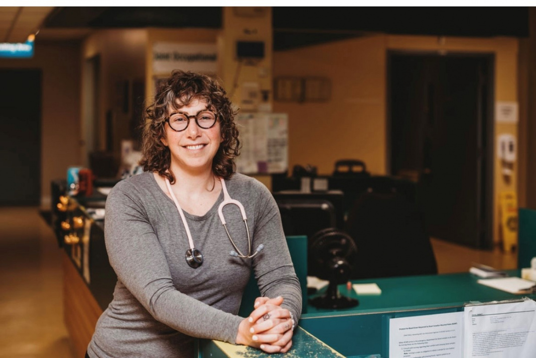 Photo of a licensed practical nurse sitting down and smiling, taken at Eastern Shore Memorial Hospital