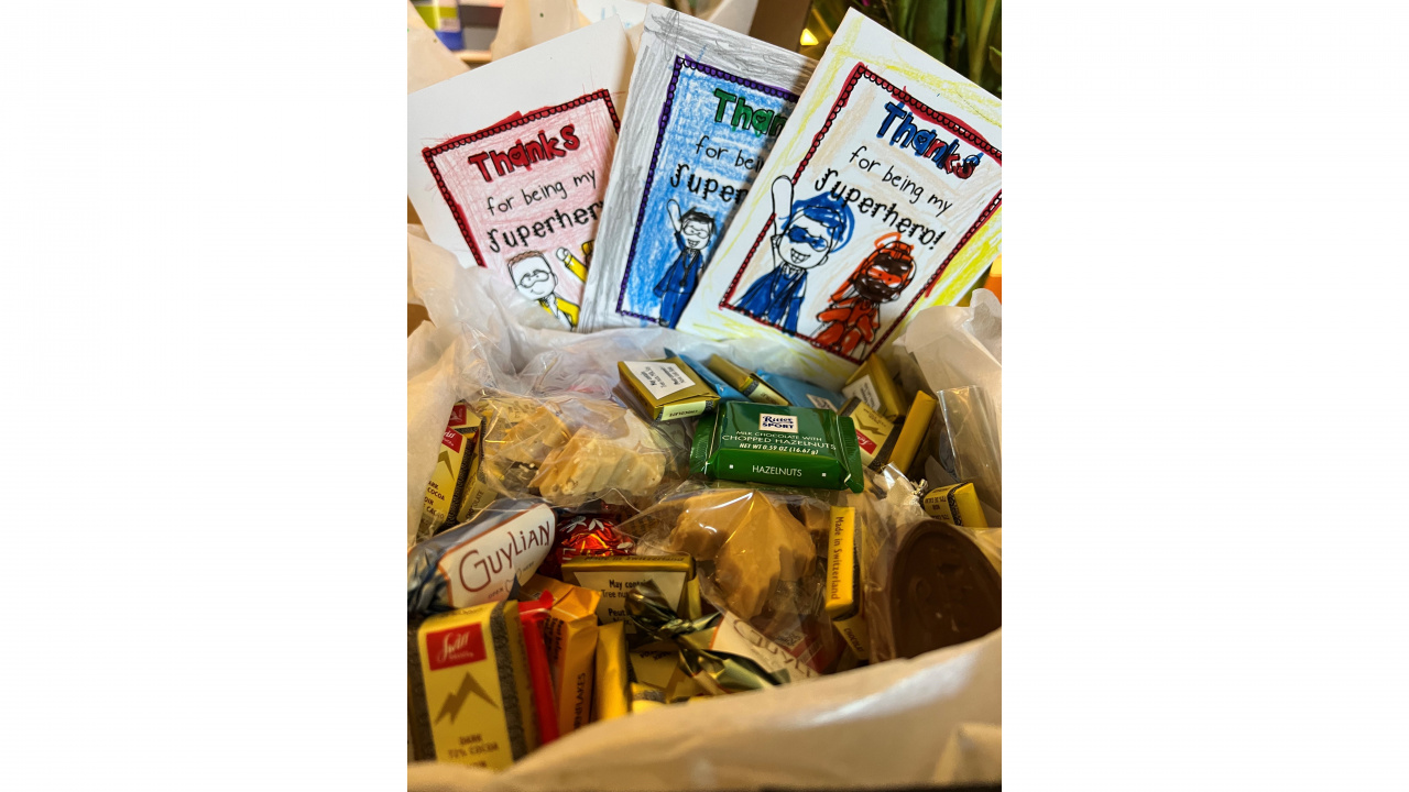 Photo of a basket of goodies and thank you cards