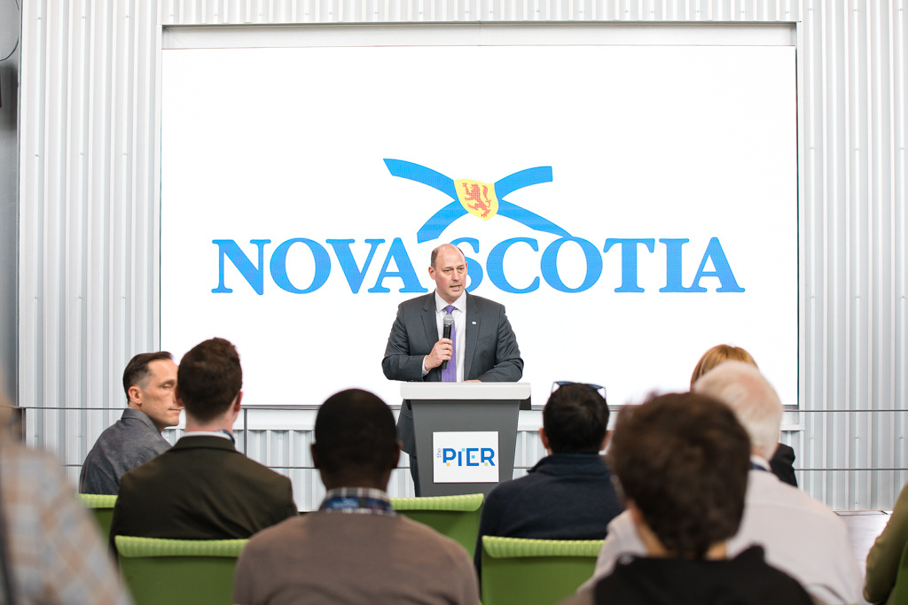 Environment and Climate Change Minister Timothy Halman at a podium