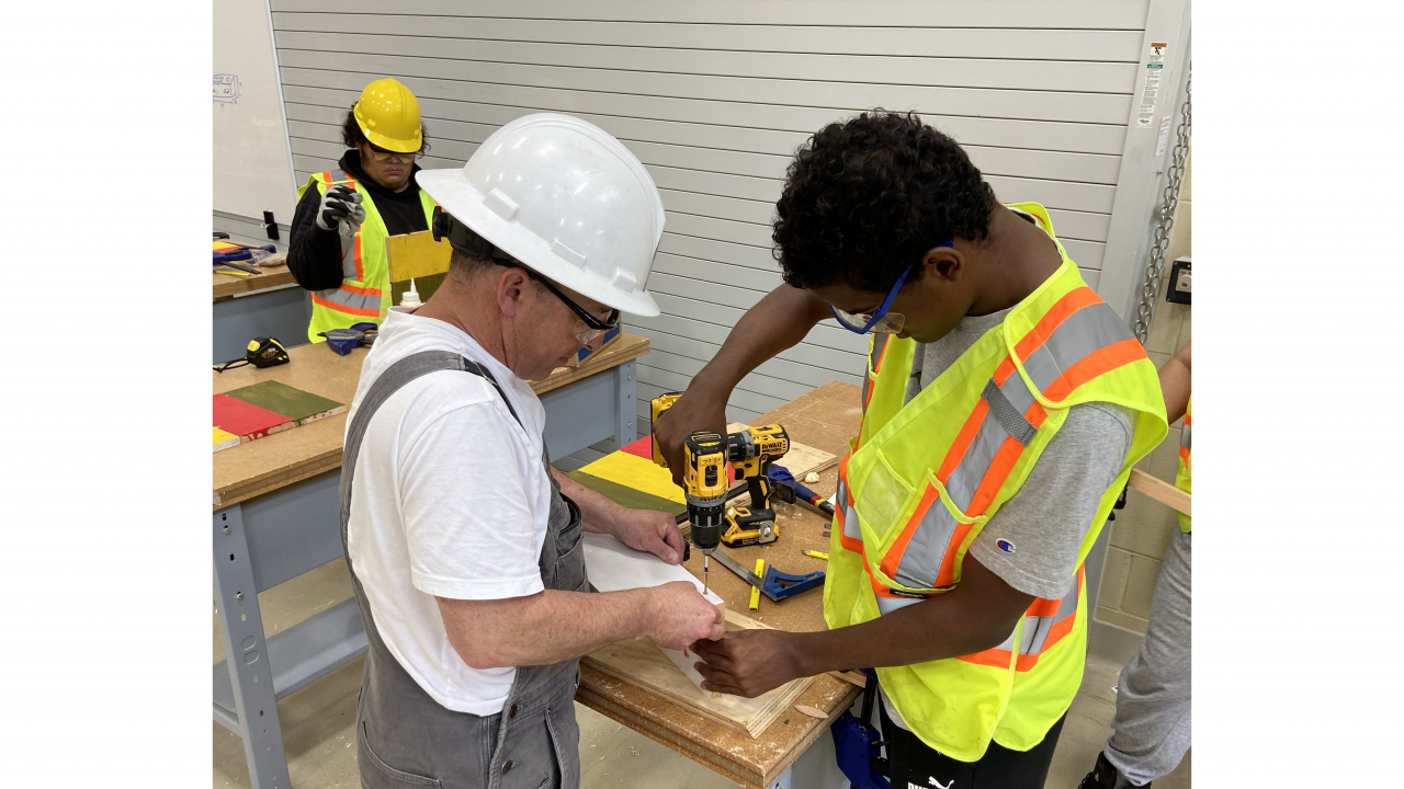 Photo of carpentry student and instructor