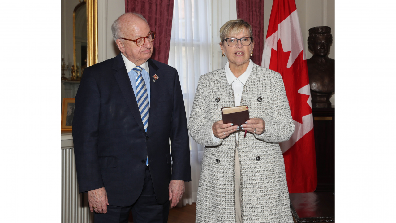 Photo of Lt.-Gov. Arthur J. LeBlanc and new Justice Minister Barbara Adams at her swearing-in ceremony