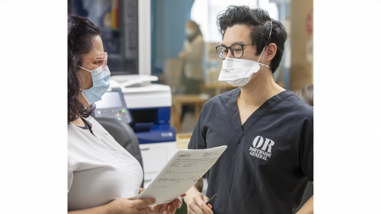 Photo of a doctor consulting with a registered nurse 