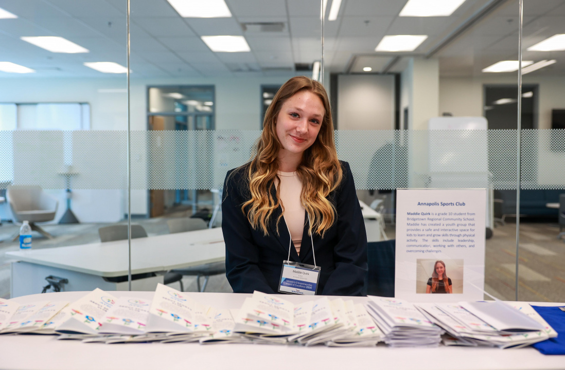 Minister’s Entrepreneurship Award of Excellence recipient Maddie Quirk promotes her business idea, Annapolis Youth Sports Club, at her booth during the student showcase. (Communications Nova Scotia)