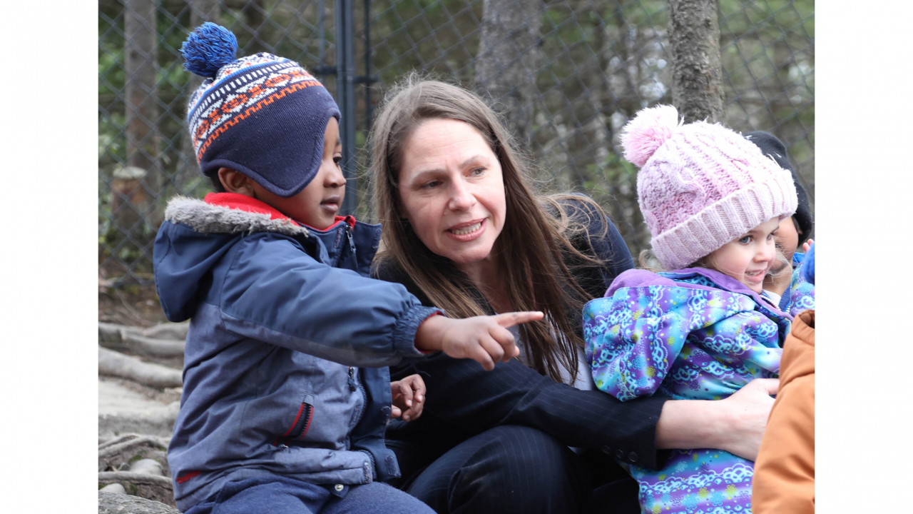 Photo of Education and Early Childhood Development Minister Becky Druhan with children