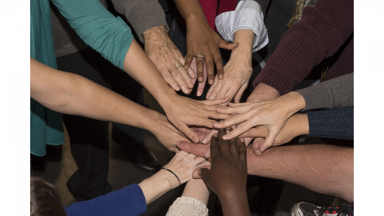 Photo of hands in a circle