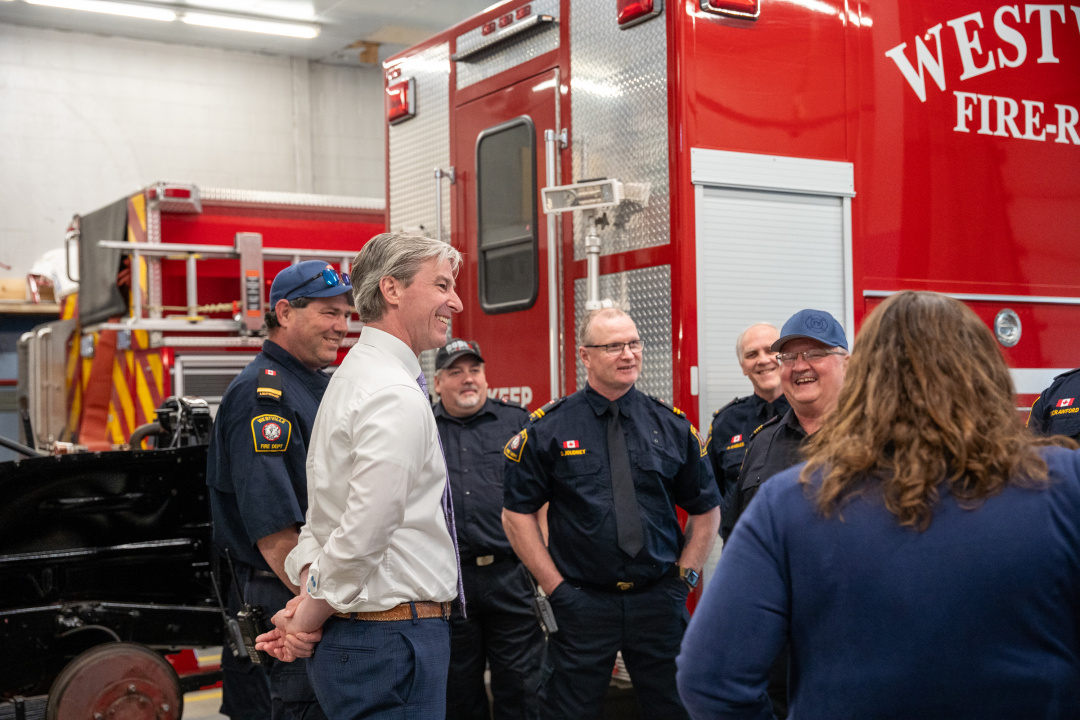 premier with firefighters