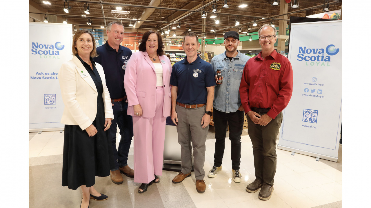 Photo of Agriculture Minister Greg Morrow, Economic Development Minister Susan Corkum-Greek and Service Nova Scotia Minister Colton LeBlanc and others at the Nova Scotia Loyal launch