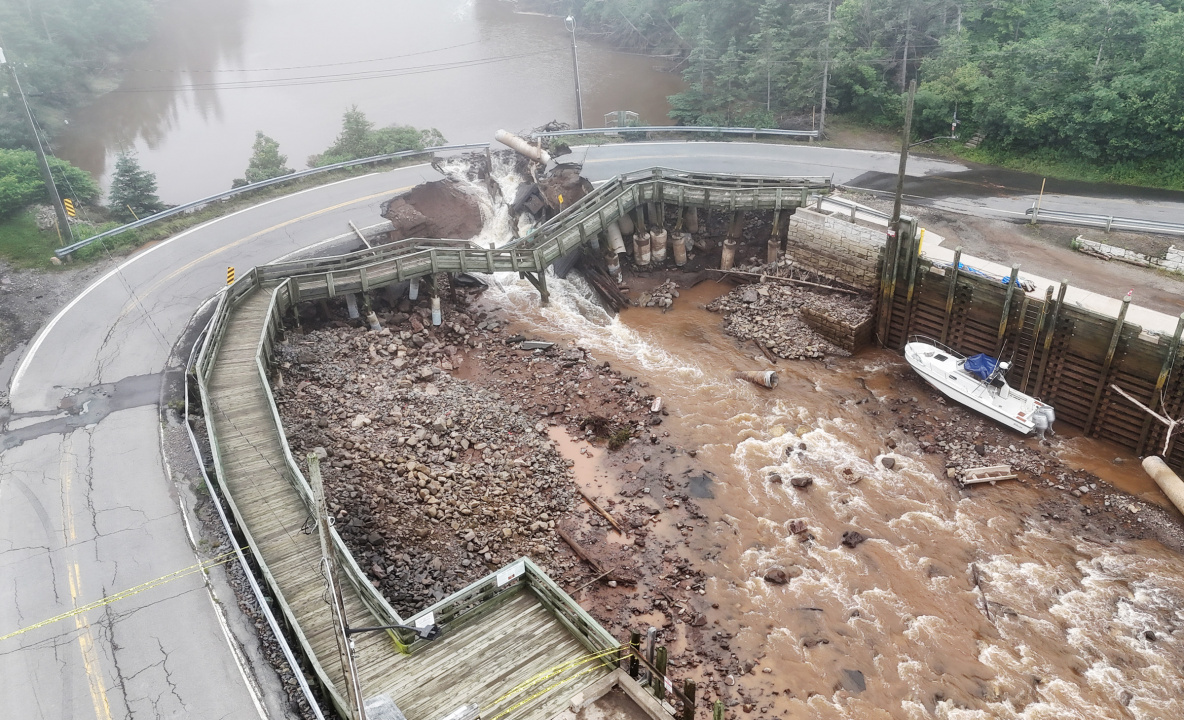 Photo of water breaking through a road in Halls Harbour