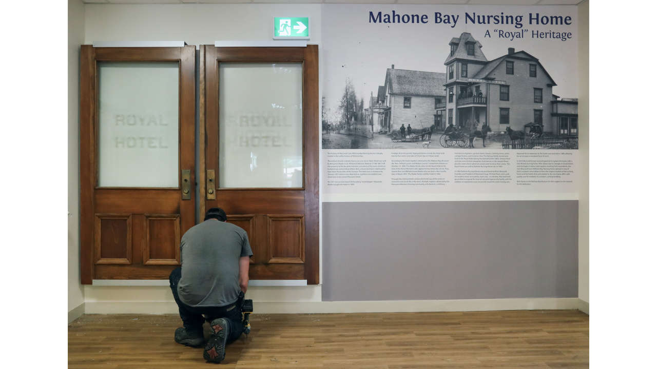 Photo of worker at the Royal Hotel display in the Mahone Bay Nursing Home