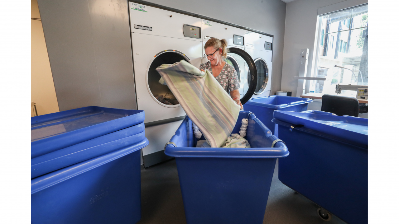 Photo of woman in laundry room at Mahone Bay Nursing Home