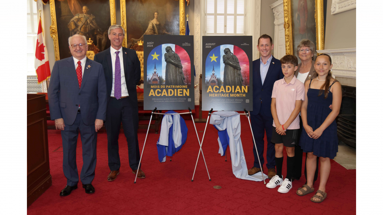 The Acadian Heritage Month poster was launched during the event by (L-R) Lt-Gov. Arthur J. LeBlanc, Premier Tim Houston, Acadian Affairs and Francophonie Minister Colton LeBlanc, and Denise Comeau Desautels, President, Fédération acadienne de la Nouvelle-Écosse.