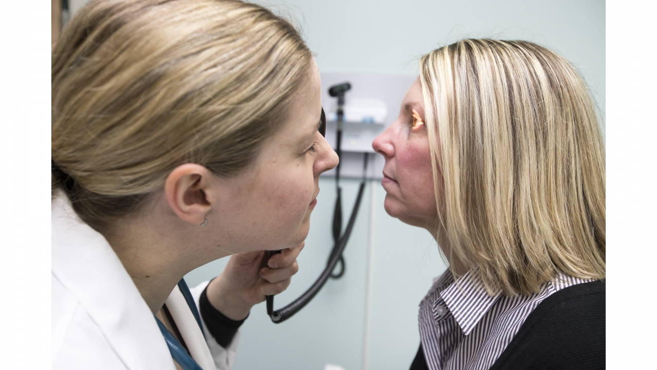 Photo of a doctor examining a patient