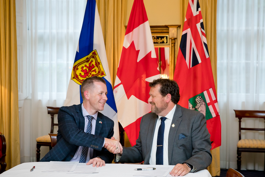 the ministers shake hands