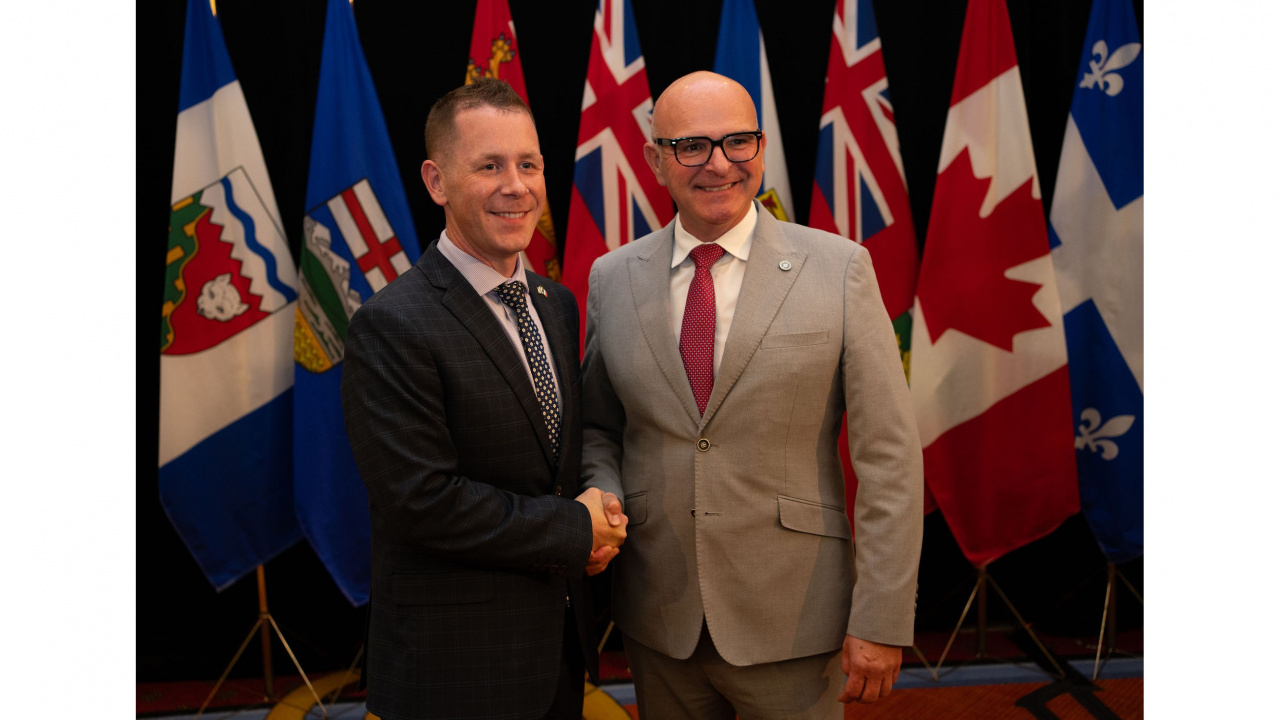 Colton LeBlanc, Minister of Acadian Affairs and Francophonie, left, and Randy Boissonnault, federal Minister of Employment, Workforce Development and Official Languages