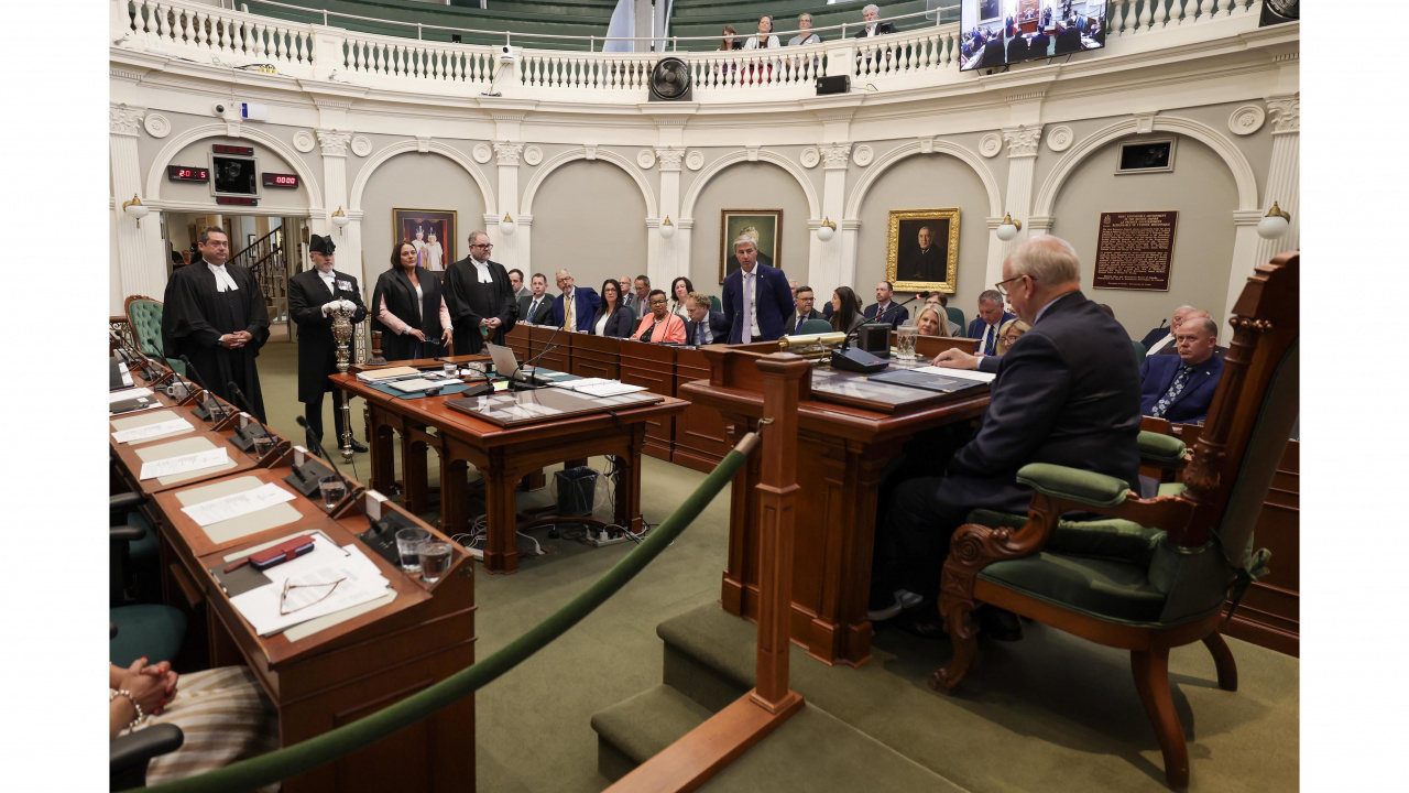 Photo of Lt.-Gov. Arthur LeBlanc in the Speaker's chair across from new Speaker Danielle Barkhouse