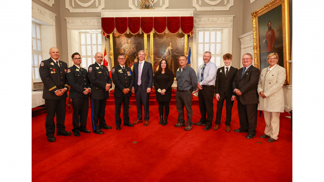 Photo of 2024 Medal of Bravery award recipients with Premier Tim Houston and Justice Minister Barbara Adams.