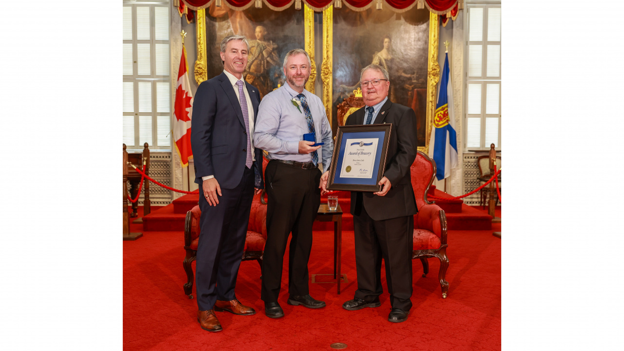 Photo of 2024 Medal of Bravery award recipient Bruce Lake with Premier Tim Houston and Medal of Bravery Advisory Committee Chair Tom Steele