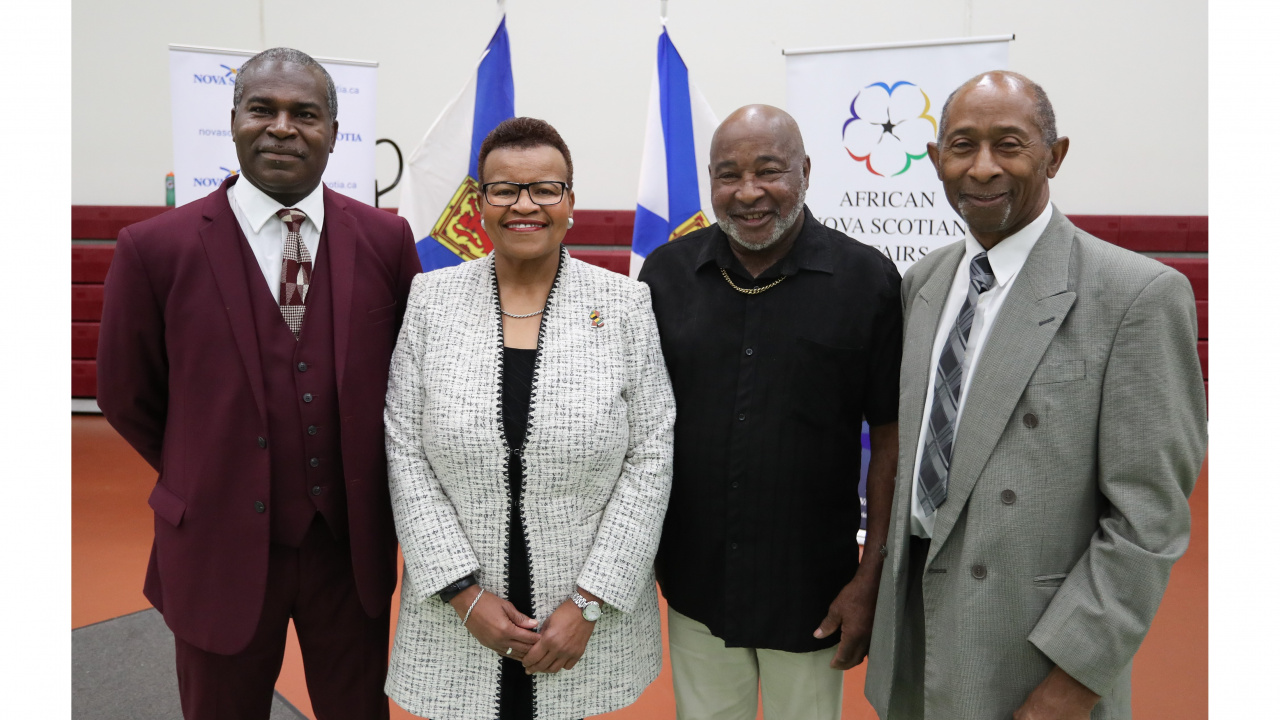 L-R: Kerry Johnston, Executive Director, Preston Area Housing Fund; African Nova Scotian Affairs Minister Twila Grosse; Ernest Simmonds, Preston Area Housing Fund board member; and Oliver Johnson, Preston Area Housing Fund board President