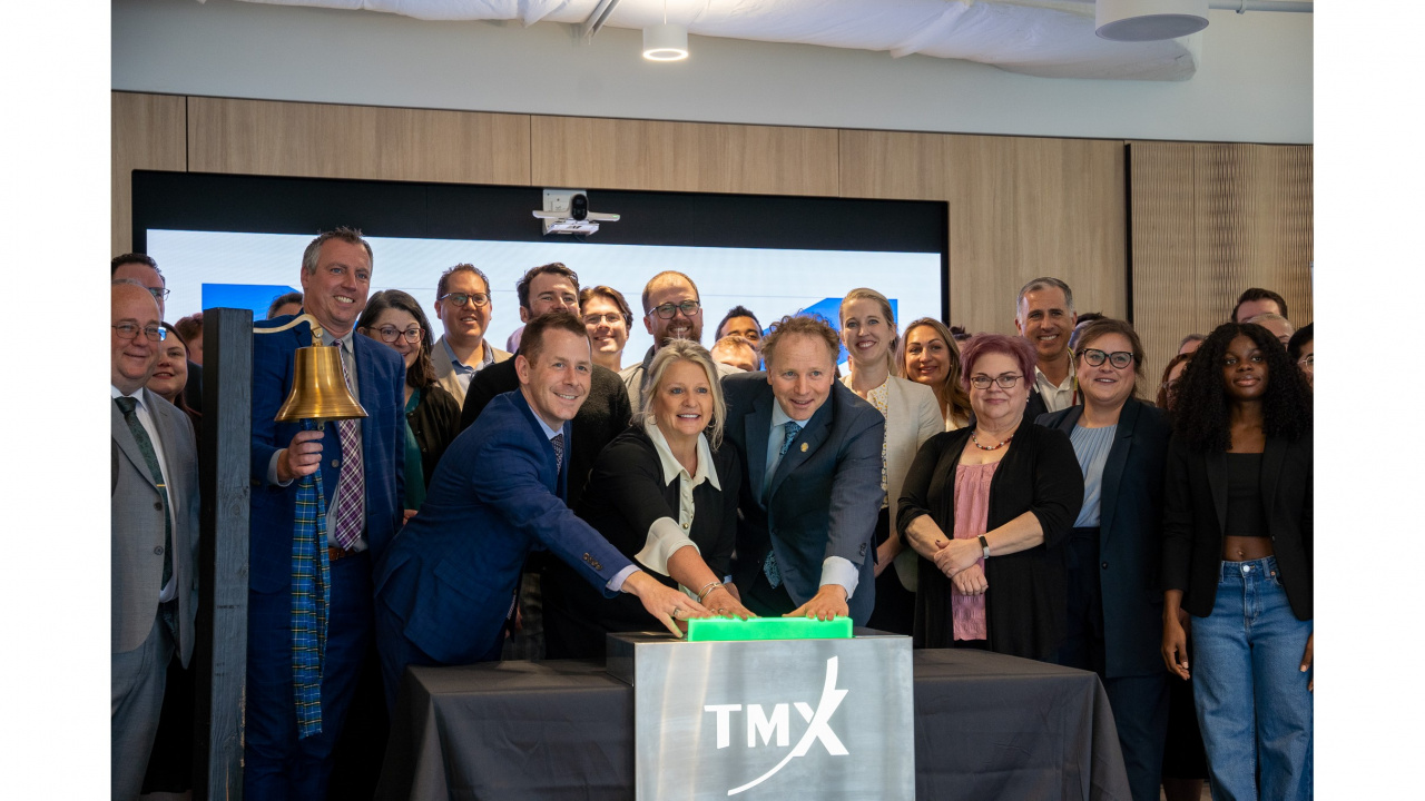 Agriculture Minister Greg Morrow rings the bell as (L-R) Service Nova Scotia Minister Colton LeBlanc, Public Works Minister Kim Masland and Deputy Premier Alan MacMaster open the Toronto Stock Exchange from the Health Innovation Hub in Halifax today, October 8. (Province of Nova Scotia)