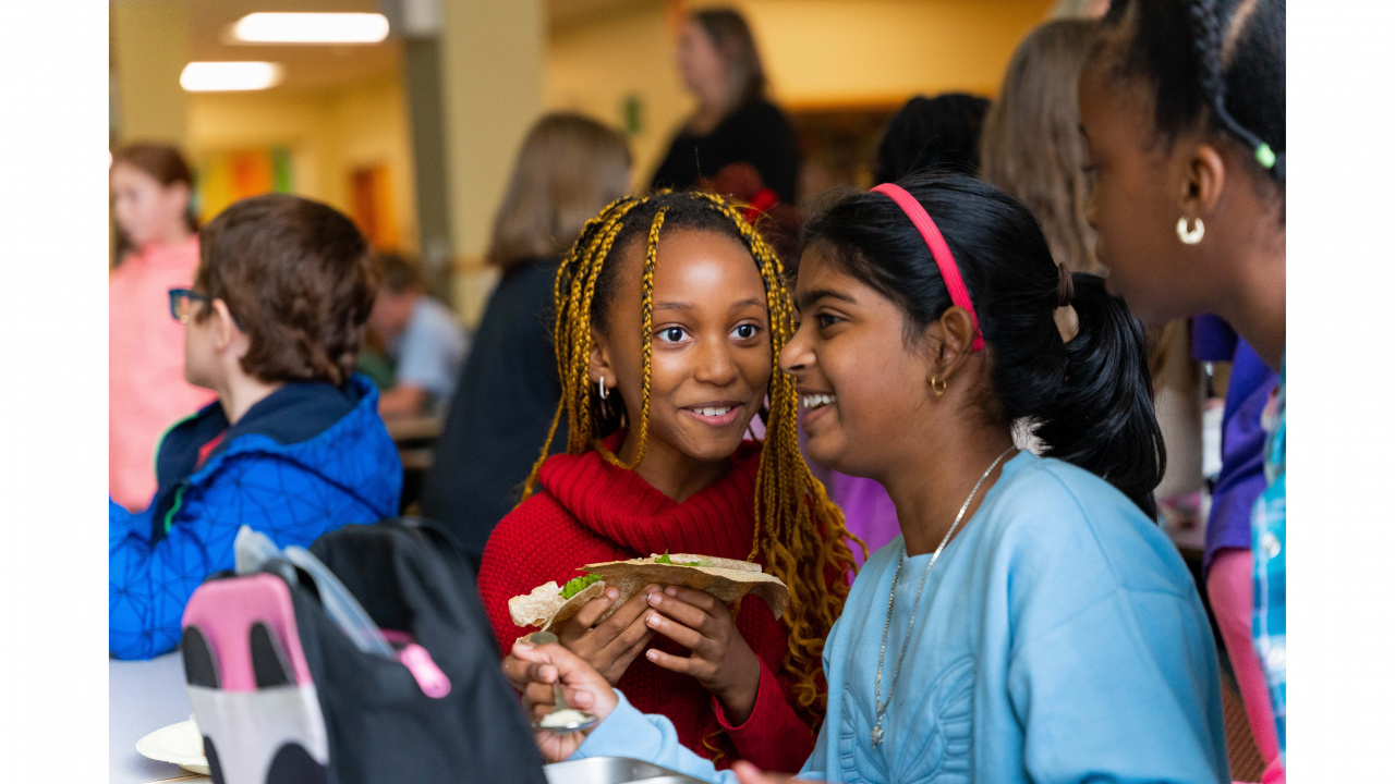 Photo of two students at lunch