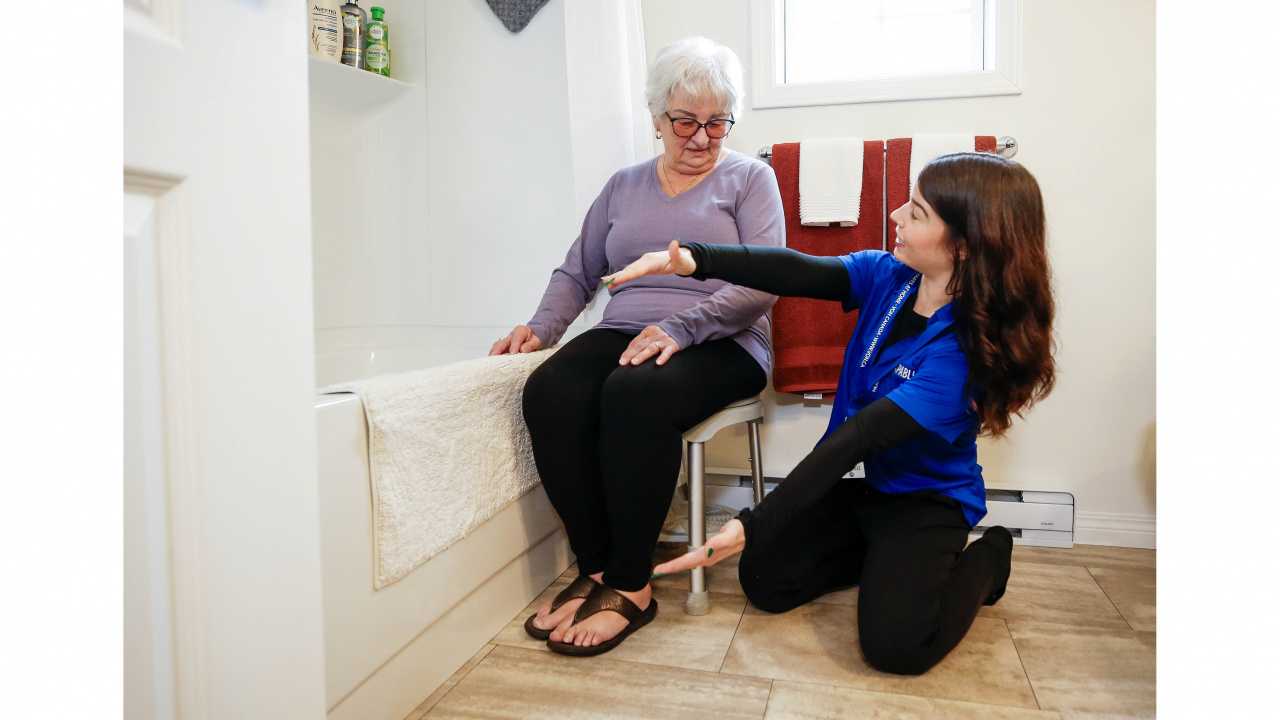 Photo of Occupational therapist and CAPABLE team member Chantel Armstrong helps a client identify small changes that will help her to continue to live safely at home