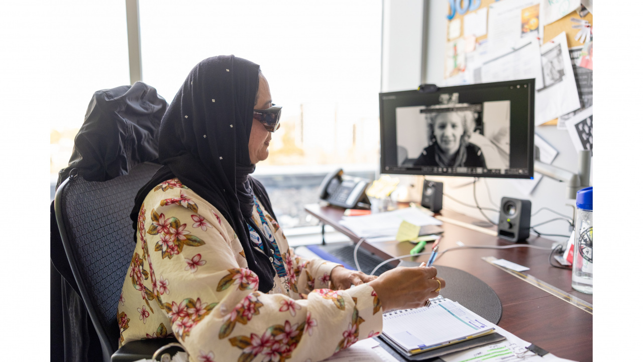 Photo of a visually impaired woman working in an office