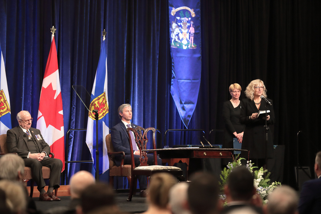 Photo of Minister Barbara Adams swearing the oath of office