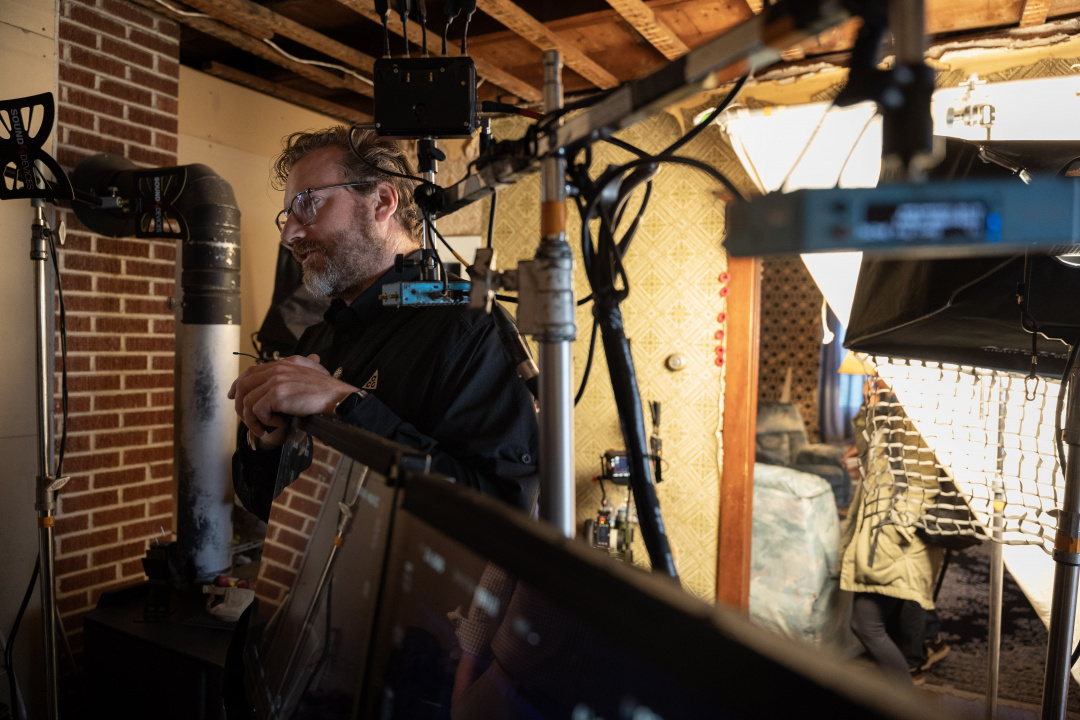 Photo of a filmmaker on set