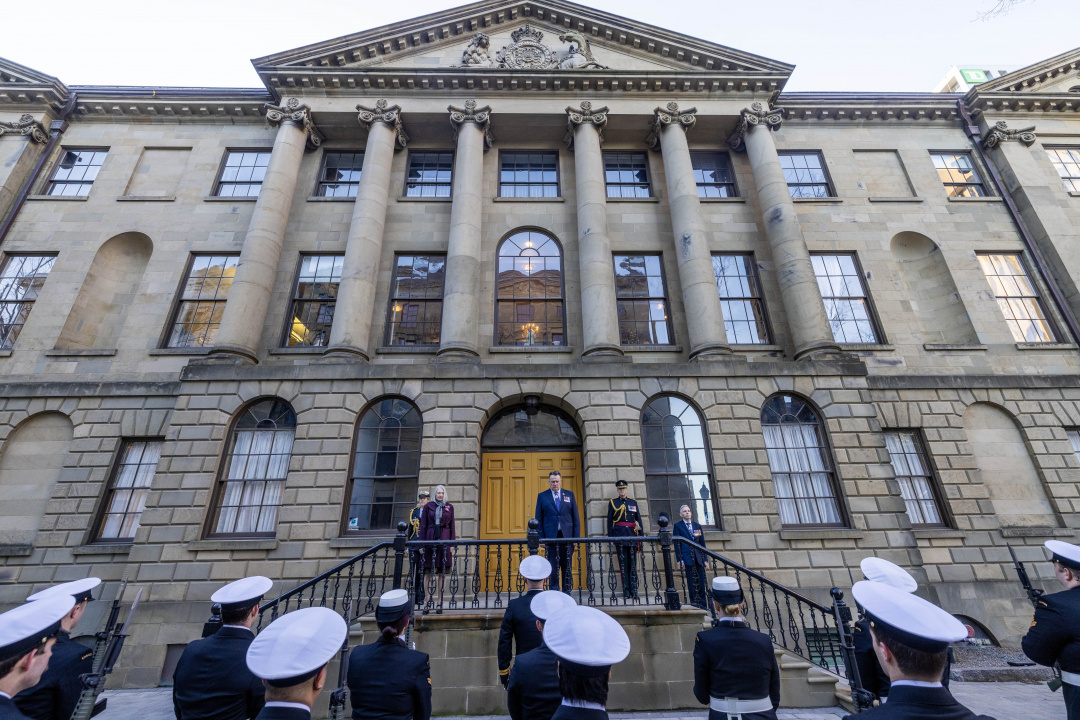 Photo of Lt.-Gov. Mike Savage outside door of Province House