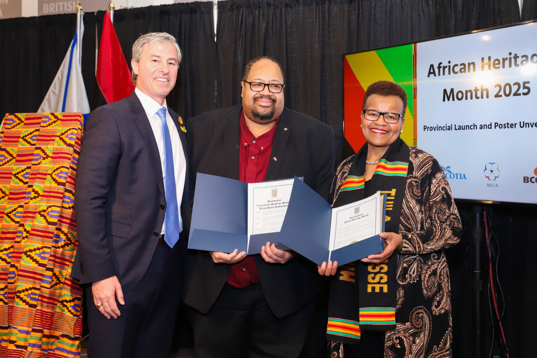 Photo of Premier Tim Houston, Russell Grosse of the Black Cultural Centre for Nova Scotia and African Nova Scotian Affairs Minister Twila Grosse