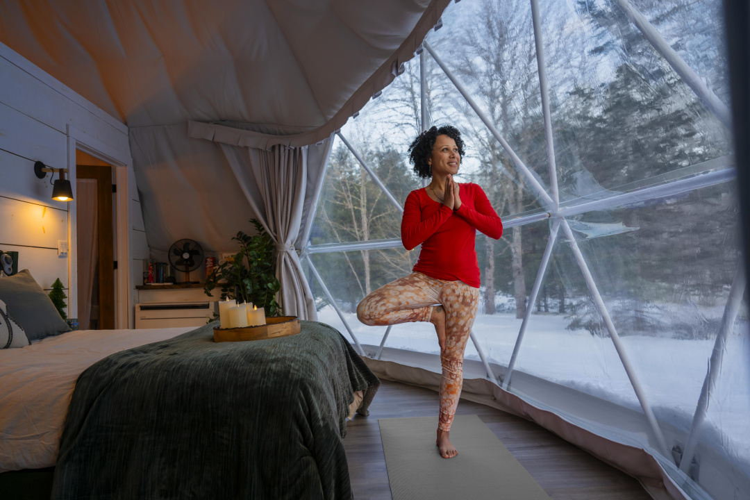 Woman doing yoga at the As the River Bends Retreat, Hantsport. 