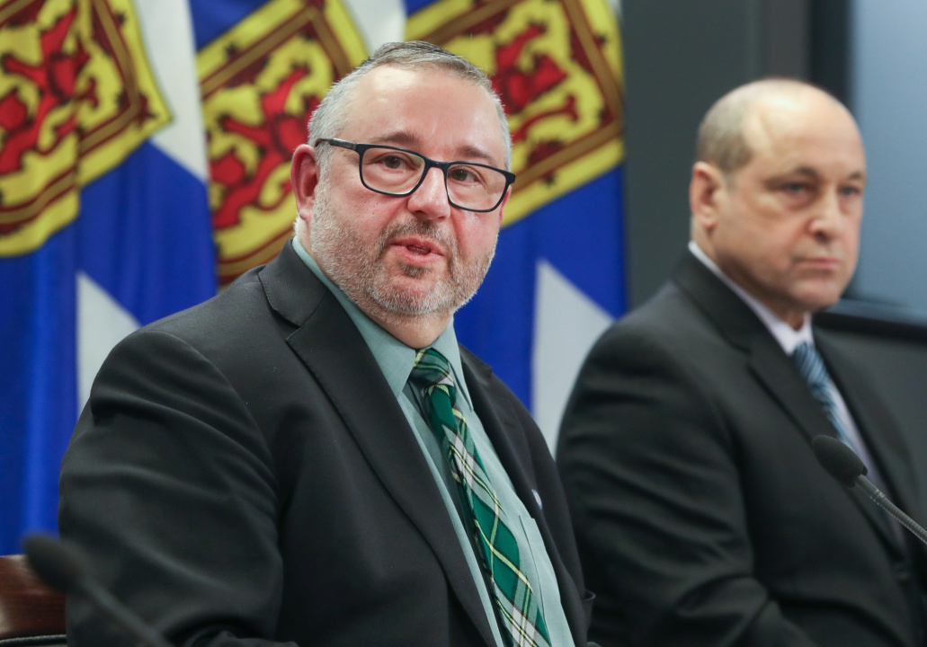 Public Works Minister Fred Tilley and Don Maillet, Executive Director of Highway Engineering and Construction with Public Works